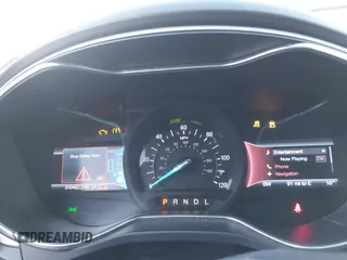 2015 Ford Fusion SE Hybrid with VIN 3FA6P0LU1FR219908, listed as a IAAI auction lot 41272688 with 310,452 mi miles. Bid and sale history available at carsss.com. Image 7.