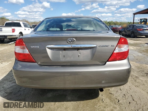 2003 Toyota Camry LE with VIN 4T1BE30K43U724778, listed as a Copart auction lot 53515605 with 176,568 mi miles and Salvage Title. Bid and sale history available at DreamBid. Image 6.
