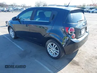 2014 Chevrolet Sonic LT with VIN 1G1JC6SB4E4151333, listed as a IAAI auction lot 41815985 with 112,123 mi miles. Bid and sale history available at carsss.com. Image 3.