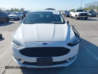 2017 Ford Fusion Hybrid Titanium с VIN 3FA6P0RU3HR323164, выставлен на аукционе IAAI как лот 42303571 с пробегом 119 732 миль миль и . История ставок и продаж доступна на DreamBid. Изображение 13.
