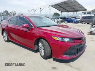 2020 Toyota Camry LE with VIN 4T1C11AK9LU991305, listed as a IAAI auction lot 41976371 with 57,422 mi miles and . Bid and sale history available at carsss.com. Image 1.
