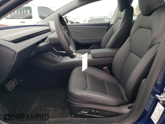 2025 Tesla Model 3 Long Range with VIN 5YJ3E1EA7SF889678, listed as a Copart auction lot 42952045 with 521 mi miles and Salvage Title. Bid and sale history available at DreamBid. Image 7.