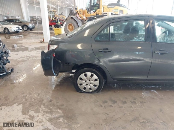 2010 Toyota Yaris with VIN JTDBT4K38A1355010, listed as a IAAI auction lot 41563391 with 154,835 mi miles. Bid and sale history available at carsss.com. Image 6.