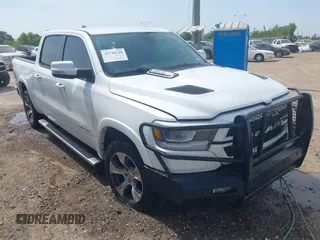 2019 Ram 1500 Laramie with VIN 1C6SRFJT3KN809810, listed as a IAAI auction lot 42796248 with 172,596 mi miles and . Bid and sale history available at DreamBid. Image 1.