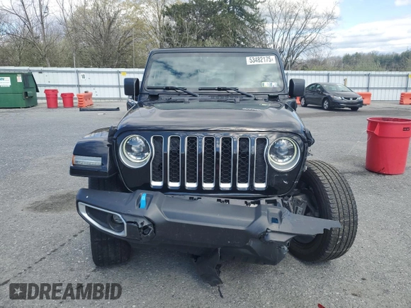 2023 Jeep Wrangler Sahara z VIN 1C4JJXP67PW513595, wystawiony jako Copart lot #53482175 z przebiegiem 30 943 mil mil oraz Szkoda całkowita • Salvage title. Historia ofert i sprzedaży dostępna na DreamBid. Obrazek 5.