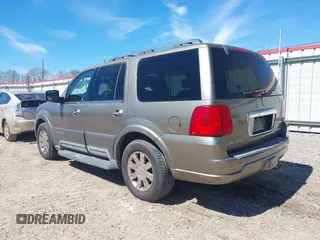 2003 Lincoln Navigator Ultimate with VIN 5LMFU27R43LJ47108, listed as a IAAI auction lot 41711964 with 127,250 mi miles. Bid and sale history available at carsss.com. Image 3.