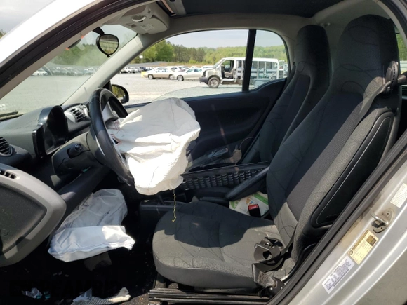 2013 Smart fortwo Pure with VIN WMEEJ3BA9DK670264, listed as a Copart auction lot 52817215 with 51,434 mi miles and Salvage Title. Bid and sale history available at DreamBid. Image 7.