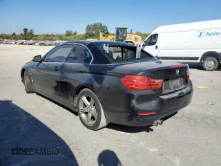 2014 BMW 4 Series 428i with VIN WBA3V7C54EJ872629, listed as a Copart auction lot 76668064 with 104,244 mi miles and Salvage title. Bid and sale history available at DreamBid. Image 2.