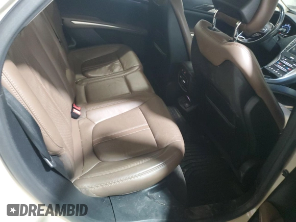 2015 Lincoln MKZ Hybrid with VIN 3LN6L2LU4FR607177, listed as a Copart auction lot 57472145 with 121,708 mi miles and Salvage title. Bid and sale history available at DreamBid. Image 10.