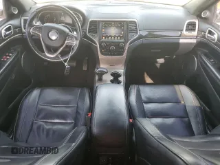 2015 Jeep Grand Cherokee Overland with VIN 1C4RJFCMXFC237723, listed as a Copart auction lot 50318145 with 103,741 mi miles and Salvage title. Bid and sale history available at DreamBid. Image 8.