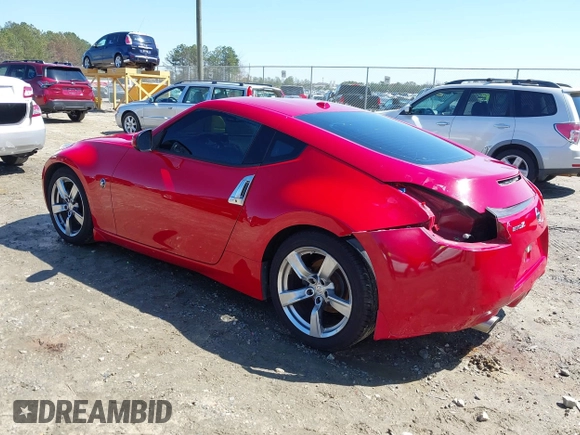 2009 Nissan 370Z Touring with VIN JN1AZ44E69M405179, listed as a IAAI auction lot 41762303 with 132,853 mi miles and . Bid and sale history available at DreamBid. Image 3.