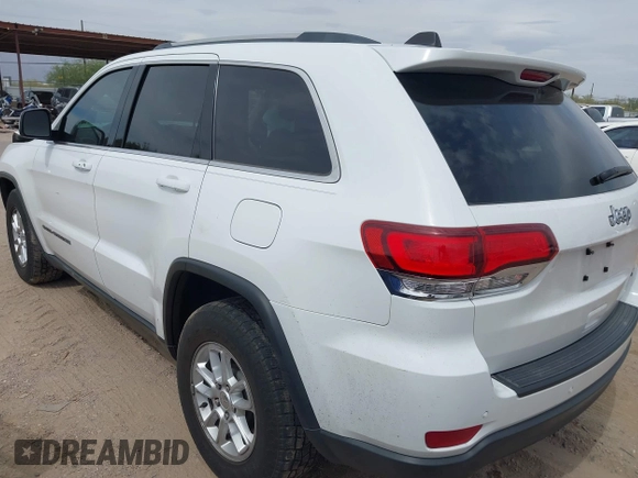2020 Jeep Grand Cherokee Altitude with VIN 1C4RJEAG7LC328824, listed as a IAAI auction lot 42253946 with 94,035 mi miles and . Bid and sale history available at DreamBid. Image 3.