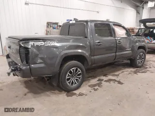 2020 Toyota Tacoma 4WD SR5 with VIN 3TMCZ5AN9LM355230, listed as a IAAI auction lot 41240351 with 122,164 mi miles. Bid and sale history available at carsss.com. Image 4.