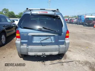 2005 Ford Escape XLT z VIN 1FMCU931X5KD62886, wystawiony jako IAAI lot #42564007 z przebiegiem 134 080 mil mil oraz . Historia ofert i sprzedaży dostępna na DreamBid. Obrazek 16.