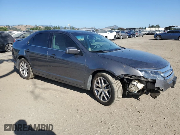 2012 Ford Fusion SEL z VIN 3FAHP0JA0CR398150, wystawiony jako Copart lot #57864455 z przebiegiem 166 046 mil mil oraz Szkoda całkowita • Salvage title. Historia ofert i sprzedaży dostępna na DreamBid. Obrazek 4.