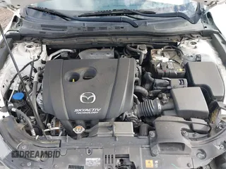 2018 Mazda 3 Touring with VIN 3MZBN1L31JM225108, listed as a IAAI auction lot 41959304 with 74,933 mi miles. Bid and sale history available at carsss.com. Image 10.