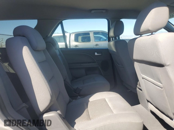 2006 Ford Freestyle SE z VIN 1FMZK011X6GA00401, wystawiony jako Copart lot #56218835 z przebiegiem 148 590 mil mil oraz Szkoda całkowita • Salvage title. Historia ofert i sprzedaży dostępna na DreamBid. Obrazek 11.