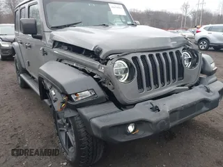 2021 Jeep Wrangler Unlimited Sport S with VIN 1C4HJXDG5MW614688, listed as a IAAI auction lot 41678964 with 89,309 mi miles. Bid and sale history available at carsss.com. Image 18.