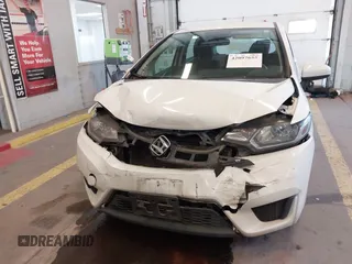 2015 Honda Fit LX with VIN 3HGGK5H57FM106670, listed as a IAAI auction lot 42097655 with 116,303 mi miles and . Bid and sale history available at DreamBid. Image 12.
