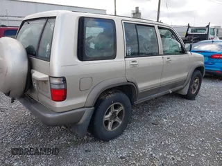 2000 Isuzu Trooper S z VIN JACDS58X5Y7J16368, wystawiony jako IAAI lot #41020912 z przebiegiem 292 052 mil mil oraz . Historia ofert i sprzedaży dostępna na DreamBid. Obrazek 4.