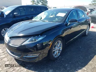 2016 Lincoln MKZ z VIN 3LN6L2G92GR612255, wystawiony jako IAAI lot #41647296 z przebiegiem 130 996 mil mil oraz . Historia ofert i sprzedaży dostępna na DreamBid. Obrazek 2.