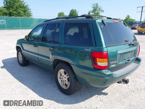 1999 Jeep Grand Cherokee Limited z VIN 1J4GW68N5XC630910, wystawiony jako IAAI lot #42380978 z przebiegiem 188 300 mil mil oraz . Historia ofert i sprzedaży dostępna na DreamBid. Obrazek 3.