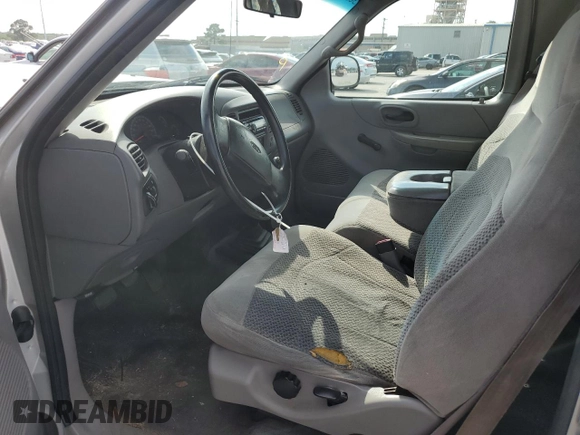 1999 Ford F-150 with VIN 1FTZX1729XNB67194, listed as a Copart auction lot 58383345 with Not provided miles and Salvage title. Bid and sale history available at DreamBid. Image 7.