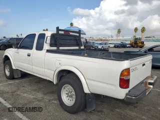 1999 Toyota Tacoma PreRunner with VIN 4TASM92NXXZ476400, listed as a Copart auction lot 81001204 with 280,797 mi miles and Salvage title. Bid and sale history available at DreamBid. Image 2.