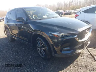 2017 Mazda CX-5 Grand Touring with VIN JM3KFBDL0H0228056, listed as a IAAI auction lot 41611567 with 85,294 mi miles. Bid and sale history available at carsss.com. Image 1.