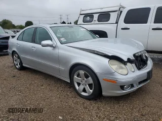 2007 Mercedes-Benz E 550 with VIN WDBUF72X77B059322, listed as a Copart auction lot 72271754 with 149,204 mi miles and Salvage Title. Bid and sale history available at DreamBid. Image 4.