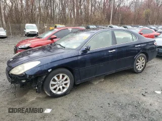 2003 Lexus ES 300 with VIN JTHBF30G036009951, listed as a Copart auction lot 50021235 with 231,411 mi miles and Salvage Title. Bid and sale history available at DreamBid. Image 1.