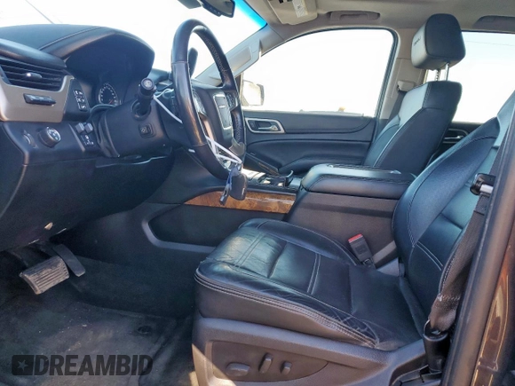 2015 GMC Yukon Denali with VIN 1GKS1CKJ7FR132677, listed as a Copart auction lot 47820925 with 144,821 mi miles and Salvage Title. Bid and sale history available at carsss.com. Image 7.