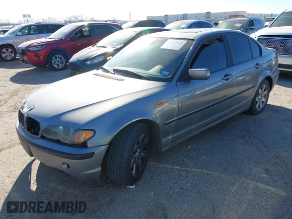 2004 BMW 3 Series 325i with VIN WBAET37414NJ84667, listed as a IAAI auction lot 41723669 with 160,384 mi miles. Bid and sale history available at carsss.com. Image 2.