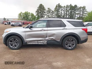 2022 Ford Explorer XLT z VIN 1FMSK7DH2NGB99767, wystawiony jako IAAI lot #41945162 z przebiegiem 59 383 mil mil oraz . Historia ofert i sprzedaży dostępna na DreamBid. Obrazek 14.