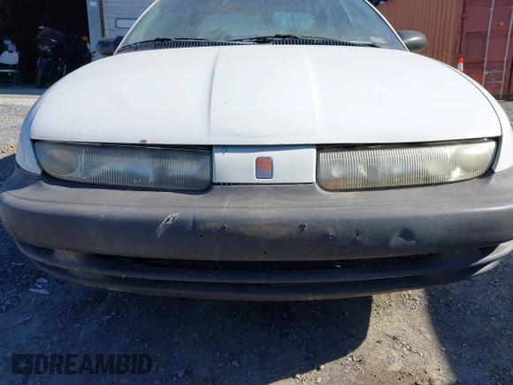1999 Saturn SL z VIN 1G8ZH5282XZ178928, wystawiony jako IAAI lot #41758412 z przebiegiem 249 418 mil mil oraz . Historia ofert i sprzedaży dostępna na DreamBid. Obrazek 13.