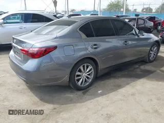 2021 Infiniti Q50 Pure with VIN JN1EV7AP3MM704464, listed as a IAAI auction lot 41915813 with 28,596 mi miles and . Bid and sale history available at DreamBid. Image 4.