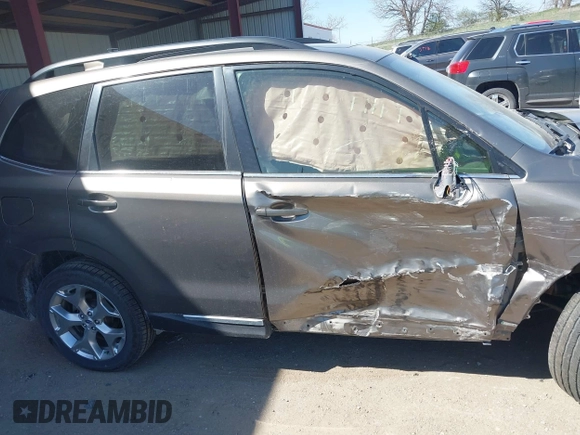 2017 Subaru Forester Touring z VIN JF2SJAWC8HH582683, wystawiony jako IAAI lot #42046369 z przebiegiem 71 070 mil mil oraz . Historia ofert i sprzedaży dostępna na DreamBid. Obrazek 12.