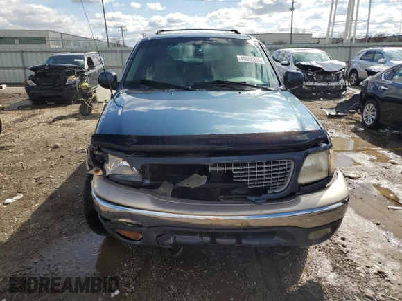 1999 Ford Expedition XLT z VIN 1FMPU18L5XLB51556, wystawiony jako Copart lot #49698855 z przebiegiem 194 898 mil mil oraz Szkoda całkowita • Salvage title. Historia ofert i sprzedaży dostępna na DreamBid. Obrazek 5.