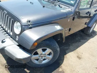 2016 Jeep Wrangler Unlimited Sahara with VIN 1C4HJWEG2GL273507, listed as a IAAI auction lot 39855004 with 87,011 mi miles and . Bid and sale history available at DreamBid. Image 6.