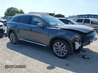 2020 Mazda CX-9 Grand Touring z VIN JM3TCADY8L0417775, wystawiony jako IAAI lot #42306864 z przebiegiem 35 287 mil mil oraz . Historia ofert i sprzedaży dostępna na DreamBid. Obrazek 1.