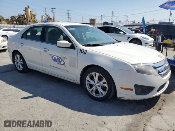 2012 Ford Fusion SE z VIN 3FAHP0HA9CR122037, wystawiony jako Copart lot #58367255 z przebiegiem 136 266 mil mil oraz Czysty tytuł • Clean title. Historia ofert i sprzedaży dostępna na DreamBid. Obrazek 4.