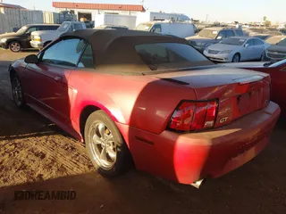 2000 Ford Mustang GT z VIN 1FAFP45X2YF186187, wystawiony jako IAAI lot #41467944 z przebiegiem 163 463 mil mil oraz . Historia ofert i sprzedaży dostępna na DreamBid. Obrazek 3.