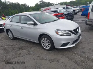 2018 Nissan Sentra S z VIN 3N1AB7AP2JY328100, wystawiony jako IAAI lot #42217451 z przebiegiem 142 831 mil mil oraz . Historia ofert i sprzedaży dostępna na DreamBid. Obrazek 1.