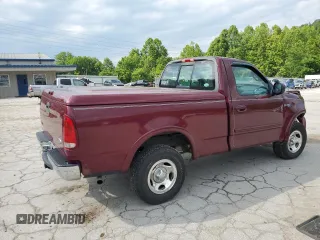 1999 Ford F-150 with VIN 1FTZF1823XNB69430, listed as a Copart auction lot 60218645 with Not provided miles and Salvage title. Bid and sale history available at DreamBid. Image 3.