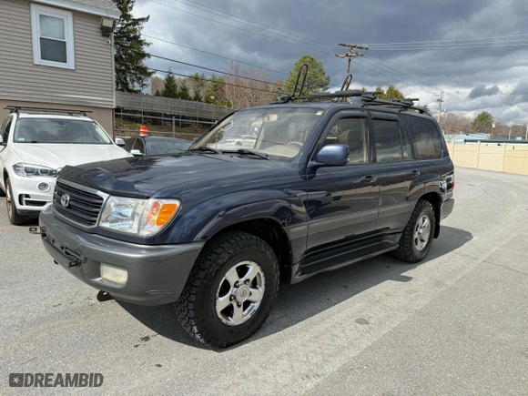 2002 Toyota Land Cruiser with VIN JTEHT05J622022972, listed as a Copart auction lot 54529135 with 299,548 mi miles and Clean Title. Bid and sale history available at carsss.com. Image 2.
