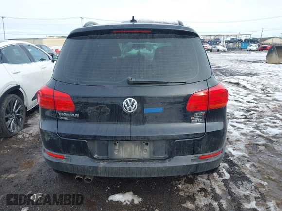 2017 Volkswagen Tiguan S with VIN WVGBV7AX7HK047973, listed as a IAAI auction lot 41197329 with 92,960 mi miles and . Bid and sale history available at DreamBid. Image 16.