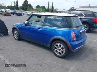 2005 MINI Hardtop with VIN WMWRC33585TJ69273, listed as a IAAI auction lot 42041797 with 150,983 mi miles and . Bid and sale history available at DreamBid. Image 3.