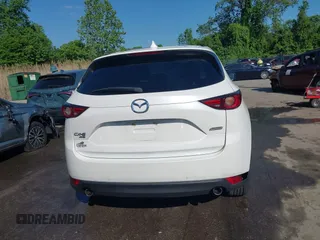 2018 Mazda CX-5 Grand Touring z VIN JM3KFBDM8J0420422, wystawiony jako IAAI lot #42188348 z przebiegiem 102 216 mil mil oraz . Historia ofert i sprzedaży dostępna na DreamBid. Obrazek 17.