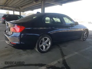 2013 BMW 3 Series 328i with VIN WBA3C1G52DNR46327, listed as a Copart auction lot 49737145 with 105,670 mi miles and Salvage Title. Bid and sale history available at DreamBid. Image 3.