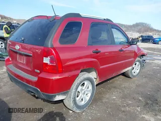 2010 Kia Sportage LX with VIN KNDKGCA39A7702017, listed as a IAAI auction lot 41596204 with 117,670 mi miles and . Bid and sale history available at carsss.com. Image 4.